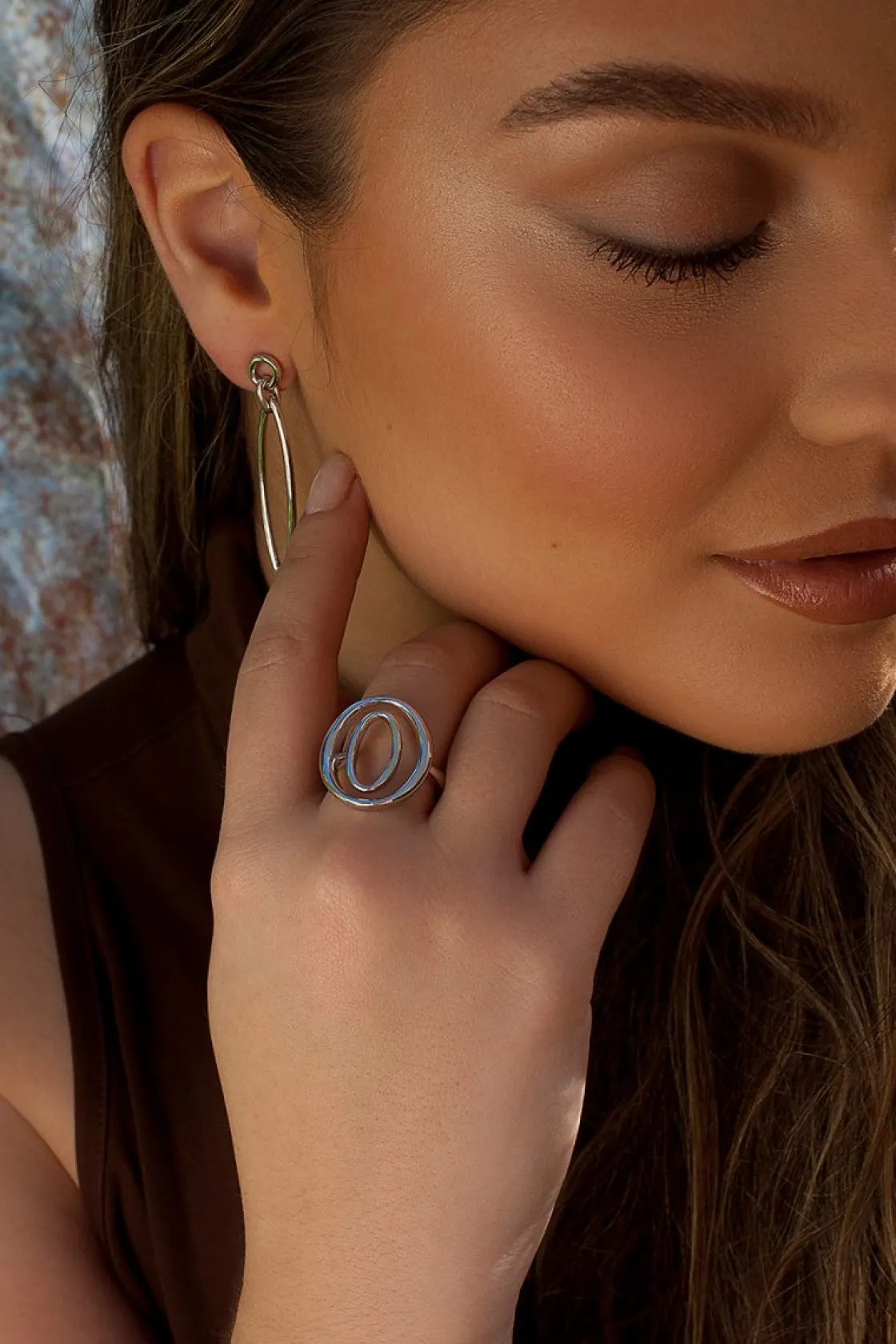 Anillos Grandes | LINEARGENT Anillos grandes en forma de dos circulos ovalados y plata lisa